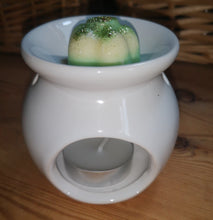 Sweet and simple, plain white ceramic wax burner.